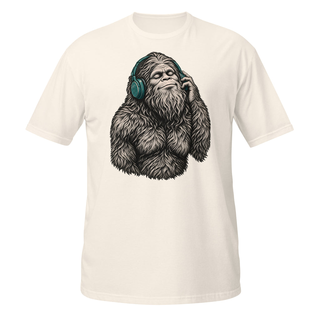 Shop the Bigfoot Headphones T-Shirt featuring a chill Sasquatch, vintage teal accents and distressed retro artwork for cryptid and music lovers.