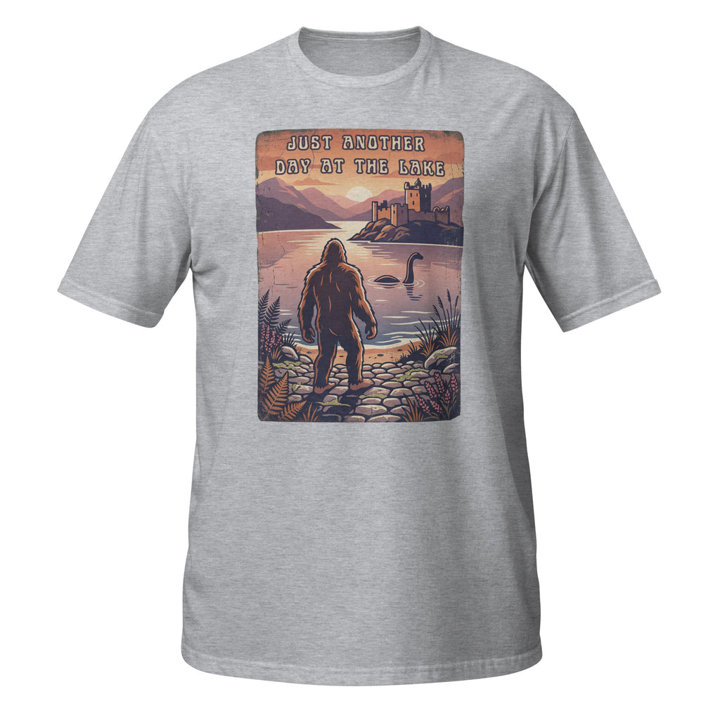 Bigfoot meets Loch Ness in this vintage-style graphic tee. “Just Another Day at the Lake” blends mystery, nature, and retro outdoor vibes 👀👣