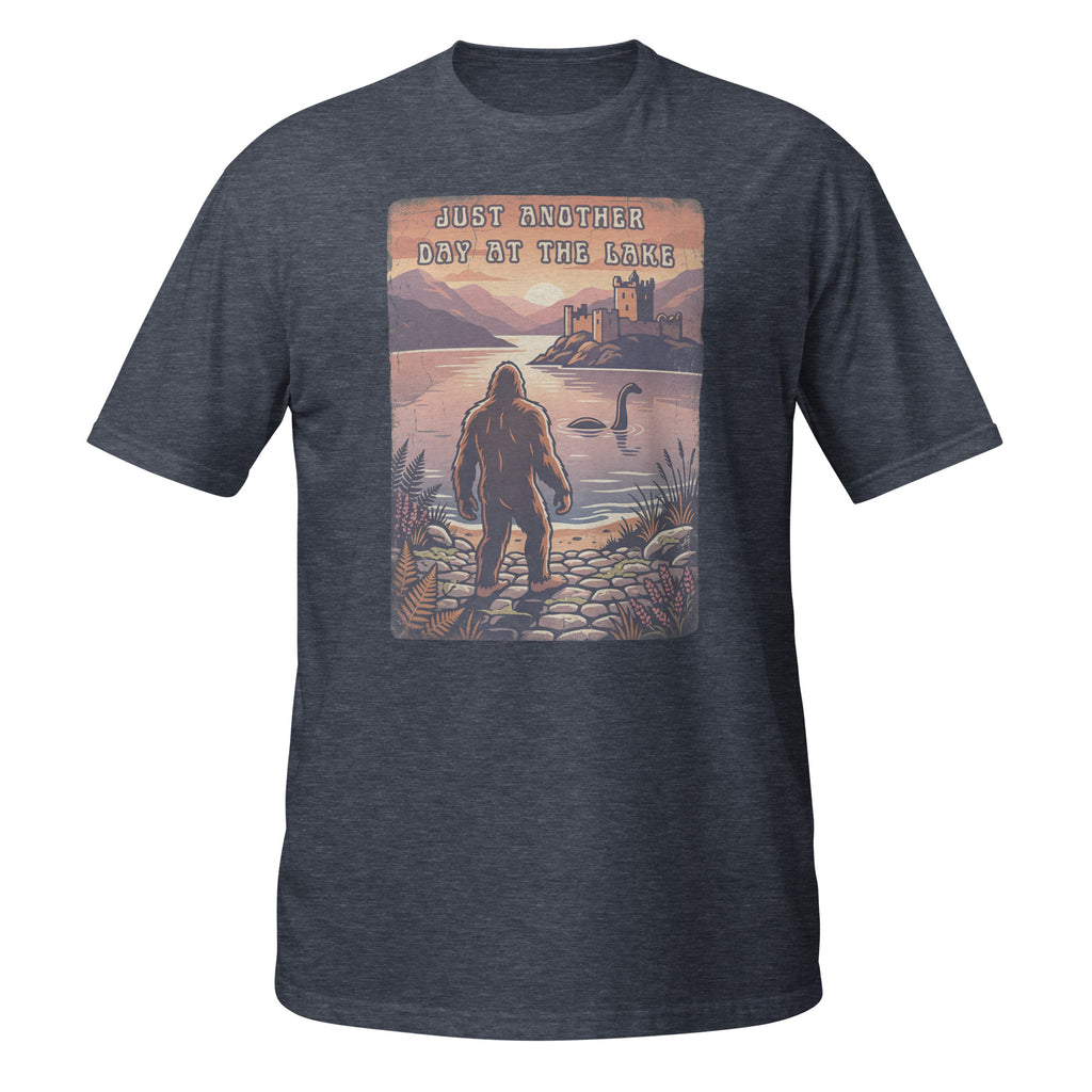 Bigfoot meets Loch Ness in this vintage-style graphic tee. “Just Another Day at the Lake” blends mystery, nature, and retro outdoor vibes 👀👣
