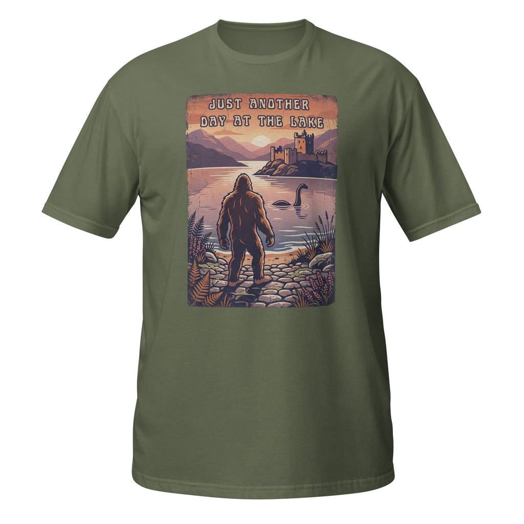 Bigfoot meets Loch Ness in this vintage-style graphic tee. “Just Another Day at the Lake” blends mystery, nature, and retro outdoor vibes 👀👣