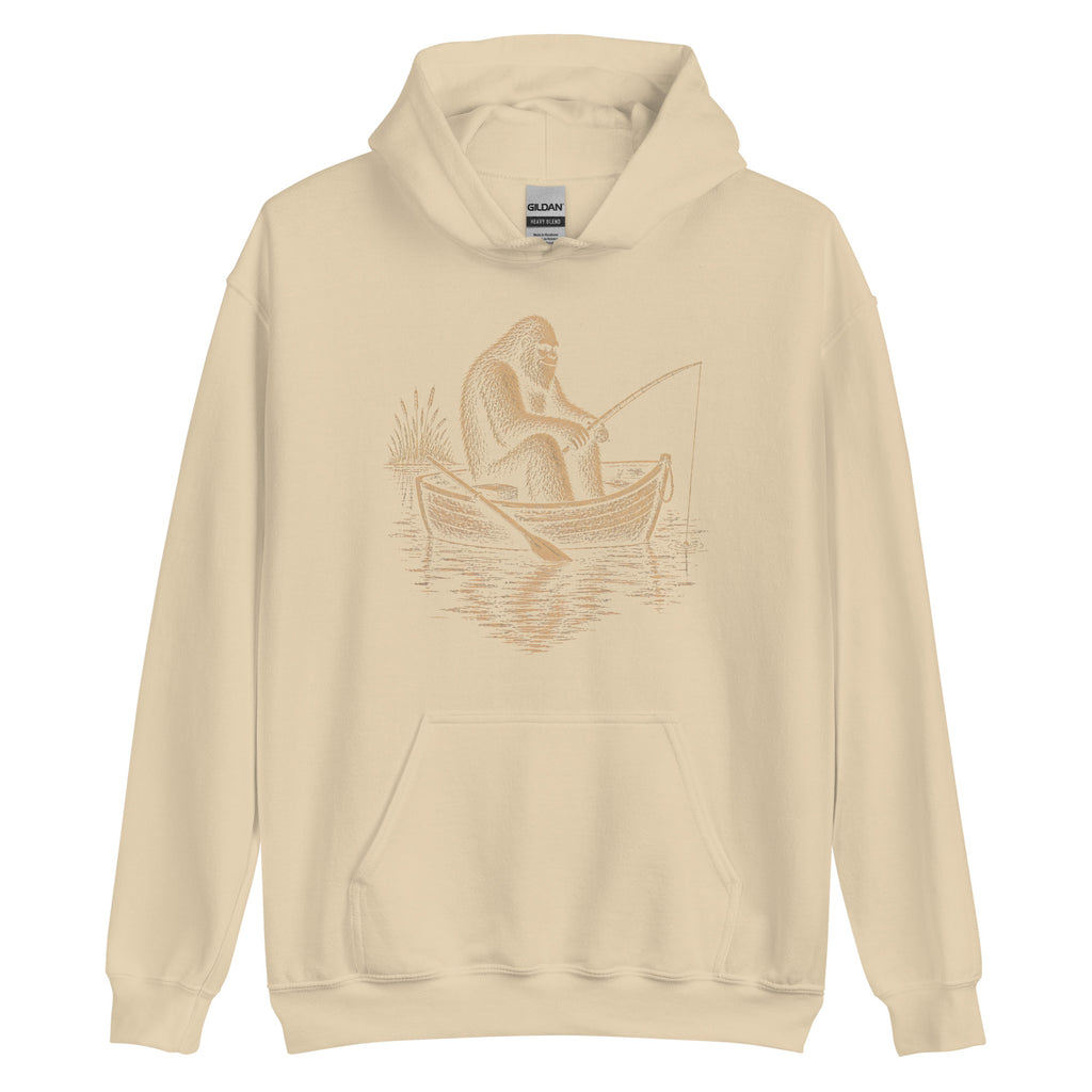 Vintage Bigfoot fishing hoodie featuring a peaceful Sasquatch in a rowboat. A cozy retro cryptid hoodie for anglers, campers and Bigfoot fans.