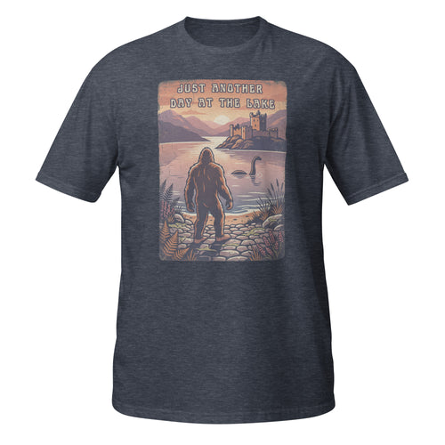 Bigfoot meets Loch Ness in this vintage-style graphic tee. “Just Another Day at the Lake” blends mystery, nature, and retro outdoor vibes 👀👣